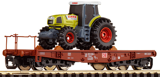Heavy duty Flat car loaded with a Claas-Tractor<br /><a href='images/pictures/Roco/37576.jpg' target='_blank'>Full size image</a>